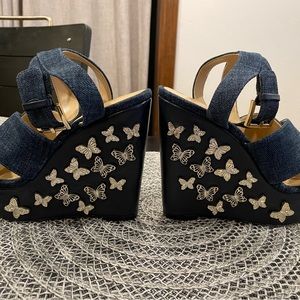 Michael Kors Blue wedge sandals w/metal butterflies.